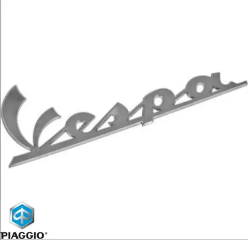 Emblema scris lateral spate stanga „Vespa” originala Vespa Elettrica - Primavera - Primavera - Sprint 50-125-150cc - montaj lateral